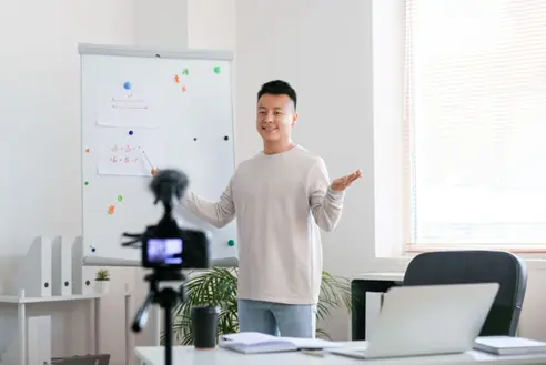 one male professor recording a lecture