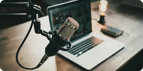 Podcast microphone and laptop